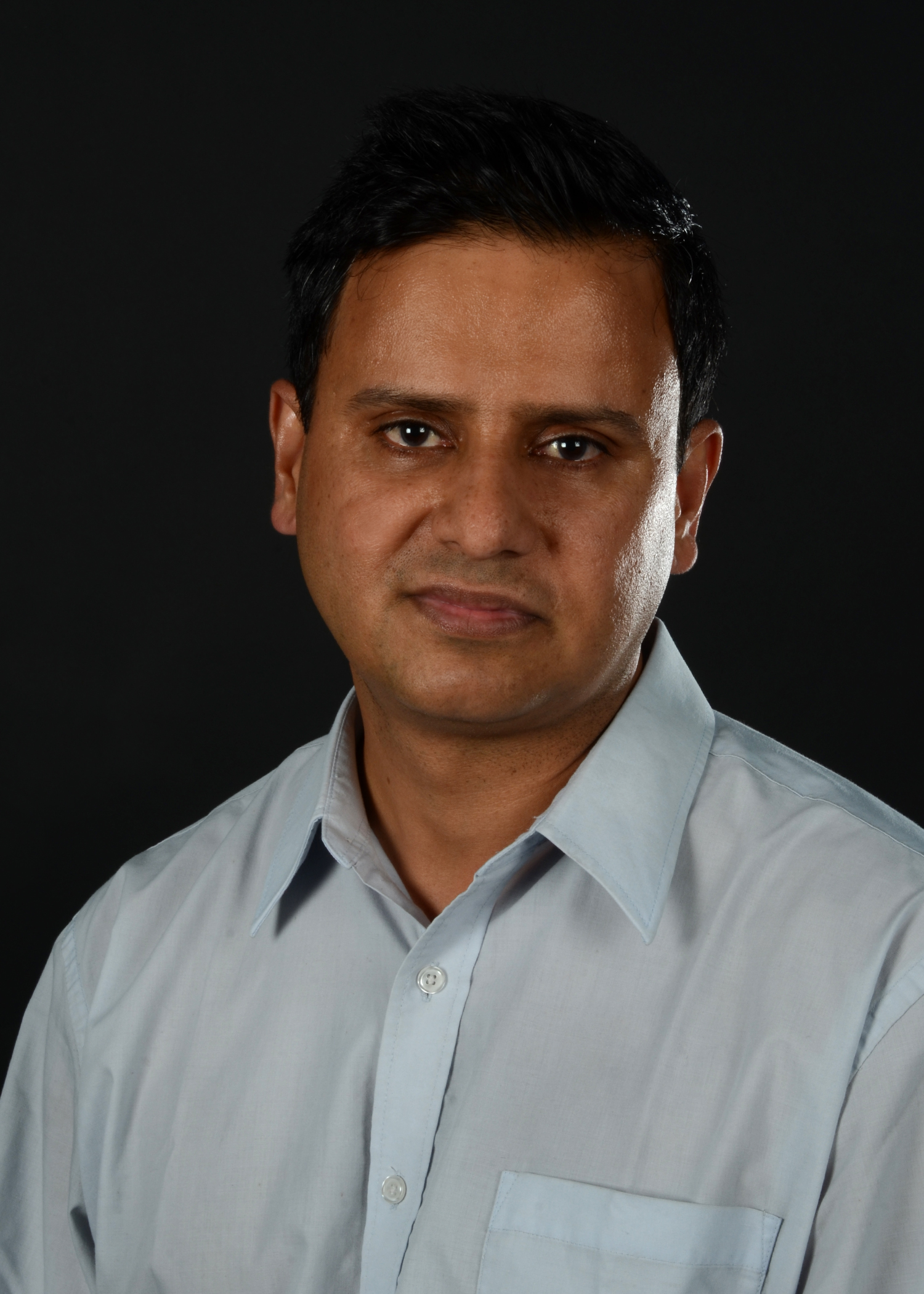 Headshot of Kurian Chandy, Systems Administrator