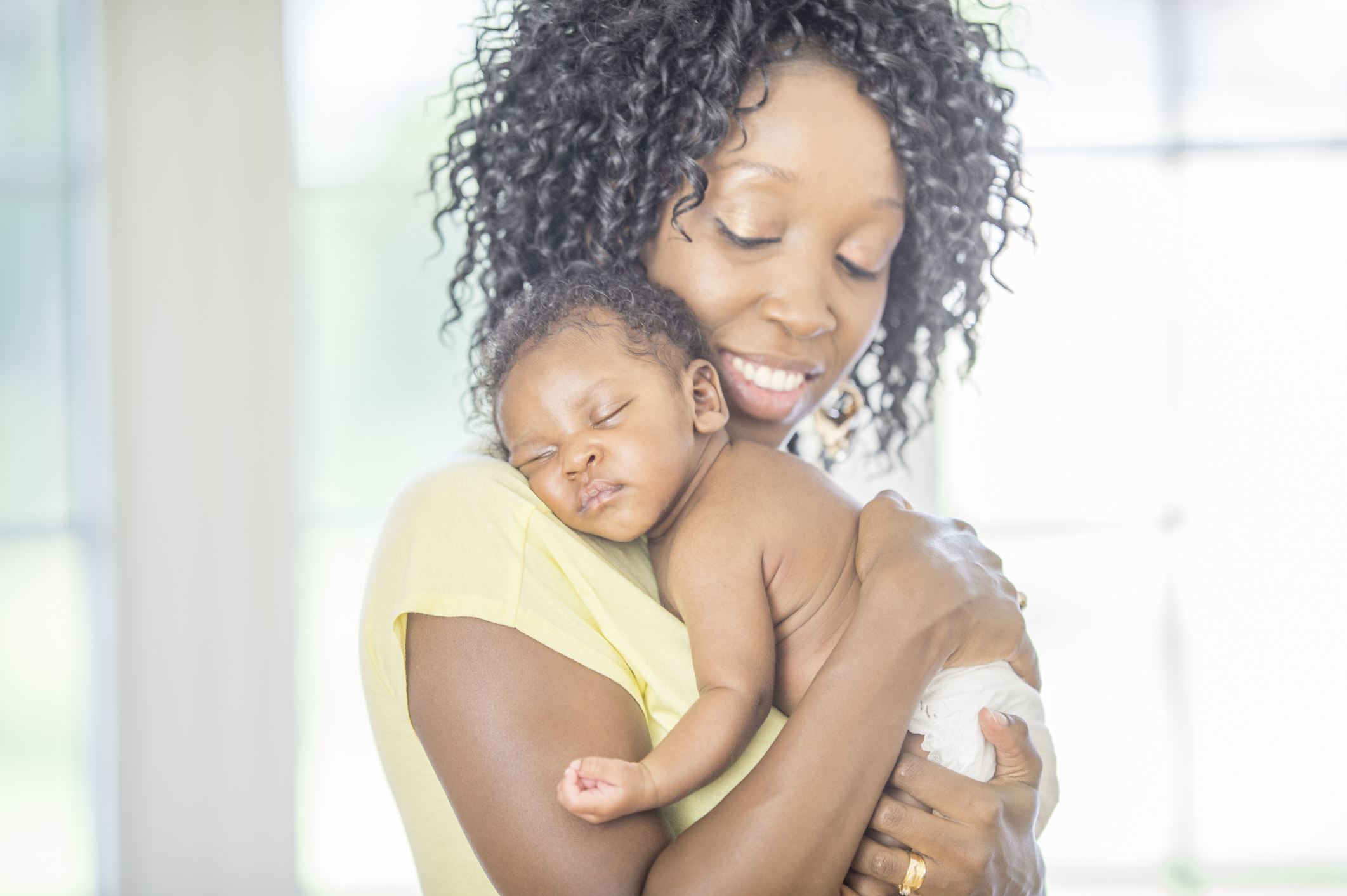 woman holding baby