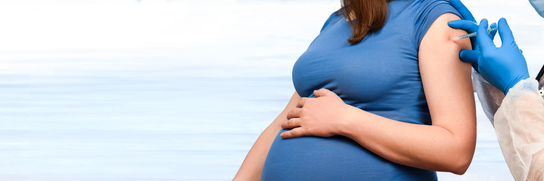 pregnant person receiving COVID vaccine