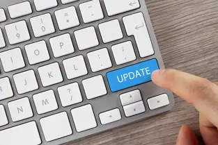 keyboard with one of the keys labeled 'update'