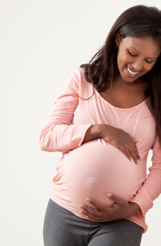 pregnant women holding her belly